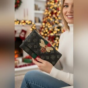 Elegant Black Clutch with Bee Embellishment